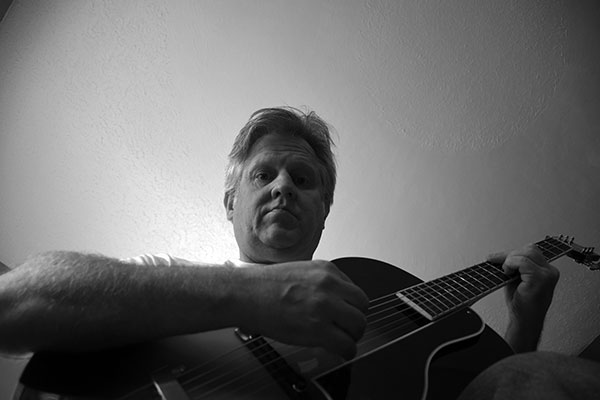 Robert Peacock with his Loar Archtop